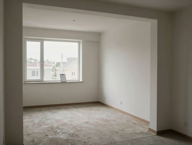 Wide shot of a vacant apartment unit interior in natural overcast daylight, clean empty rooms visible through an open doorway, inspection clipboard resting on a windowsill, no people, documentary framing