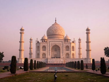 Symmetrical shot of the Taj Mahal from a quiet garden across the Yamuna River during sunrise, soft pink mist, elegant framing