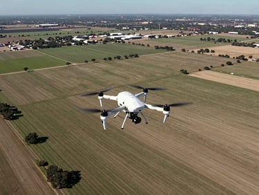 Drone flying over a large Texas land parcel, capturing aerial imagery, bright Texas daylight, wide-angle environmental shot, high contrast.