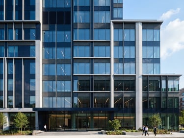 Modern corporate building facade with clean architectural lines, bright natural daylight, deep navy and neutral tones, sharp focus, 35mm
