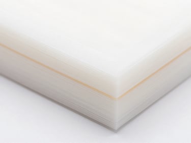 Macro photograph of ultra-clean 3D printed layers on a white background, crisp studio lighting, sharp focus on extrusion lines