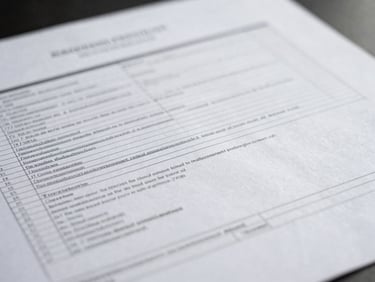 High-angle view of a complex urban regulatory document, crisp overcast daylight, desaturated cool tones, wide-angle tilt-shift lens, 35mm