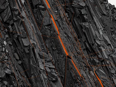 High-contrast 3D point cloud visualization of a rocky cliffside in the Conflent, with sharp orange coordinate lines overlaid on deep slate gray data points.
