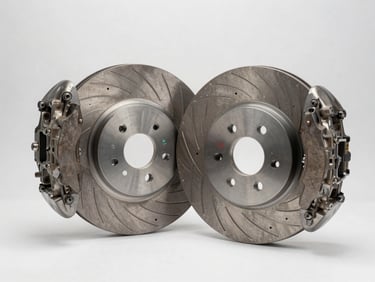 KIA brake disc and caliper assembly arranged on a white surface under clean studio lighting, sharp product photography showing rotor venting detail, no shadow cast on background