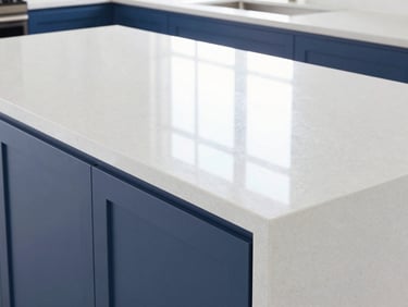 Detailed shot of the same luxury quartz kitchen counter, perfectly polished, reflecting bright window light, zero dust, pristine finish