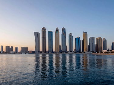 Wide panoramic view of Dubai Marina skyline at twilight, architectural geometry reflecting off deep blue water, golden hour sky, clean lines