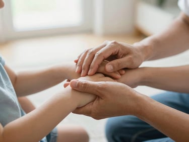 A close-up of a French family's hands, parents and child, gently holding each other in a modest, bright home, soft natural daylight, hopeful bright tones, shallow depth of field, 35mm