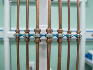 Clean medical manifold installation in a hospital room, polished copper pipes, clinical white and green tones