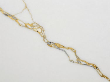 Macro flat lay of a premium ceramic tile surface, showcasing intricate gold and grey marble veins on a matte white background, crisp gallery lighting, 35mm
