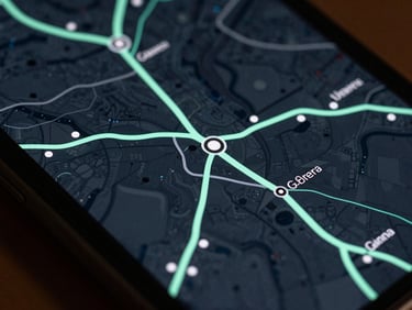 Macro shot of a Galaxy Ultra screen displaying a dark-slate navigation map with vibrant mint routing paths.
