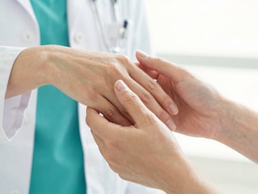Close-up of gentle hands-on care interaction, soft natural daylight, premium clean medical aesthetic.