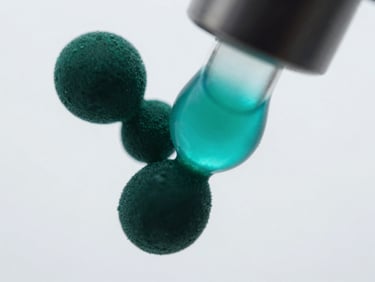 Macro close-up of crystalline carotenoid structures under a microscope, deep green and teal hues, crisp laboratory lighting, sterile background.