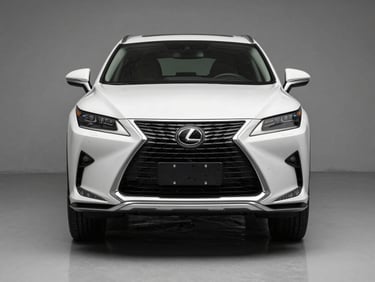 Head-on front angle of a white Lexus RX 350 on a clean grey studio floor, neutral-temperature studio lighting, badge and front fascia in sharp focus, no people