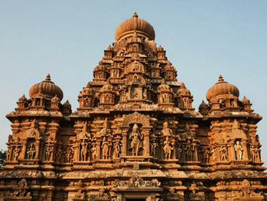 Wide shot of Konark Sun Temple carvings at sunrise, warm light, intricate details, no people.