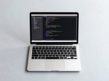 bright minimalist tech photography, flat lay of a high-end laptop displaying clean code architecture, soft diffused daylight, clean light gray background, sharp focus, 35mm