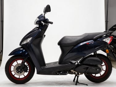 Side profile of a black Honda Wave 110S in a bright showroom, sharp automotive photography, high-contrast studio lighting, deep blacks, crisp details, 50mm lens