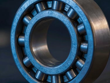 Macro close-up of a high-precision steel roller bearing, dynamic industrial lighting with blue and amber highlights, sharp focus on metallic textures