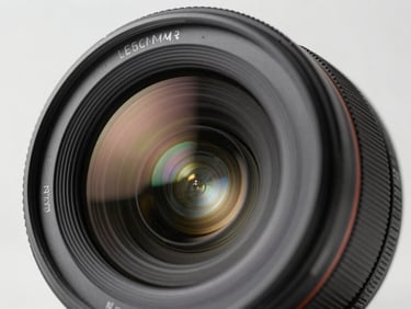 Macro shot of a mirrorless camera lens with crisp glass reflections, clean studio lighting, minimalist composition, 50mm.