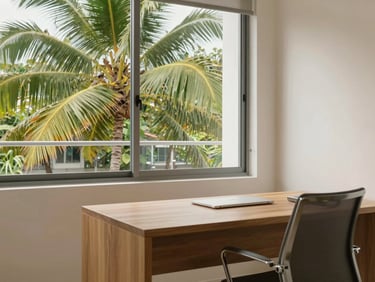 A bright modern condo interior in Phuket, natural daylight, a clean wooden desk with an office chair, large window showing palm trees, 35mm lens