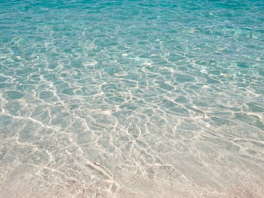 A clear-water seaside on Sithonia with Sail boat Christina
