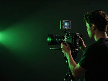 Dynamic shot of a social media content creator filming vertical video in a dark studio, neon green lighting, professional camera setup