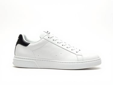 Isolated premium sneaker on a clean white studio background, sharp focus, high-key lighting, premium editorial feel