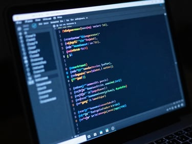 High-contrast close-up of developer terminal displaying complex code blocks, sharp blue screen glow, low-key ambient light, 35mm lens