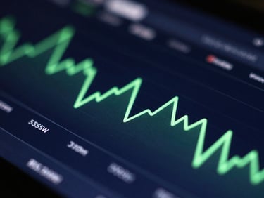 Macro close-up of a dark-mode financial dashboard UI with neon green sparklines and sharp typography, glowing under low-key ambient light.