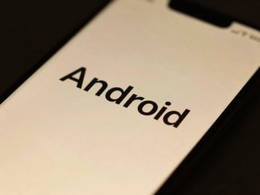Macro close-up of a high-resolution Android screen displaying flawless typography and smooth transitional animations, soft gold ambient glow, dark background.