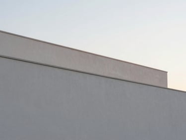 Braga minimalist building exterior, soft morning light, clean architectural lines