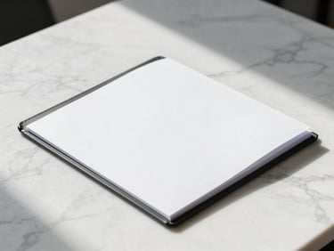 Clean physical mockup of a business document folder on a white marble table, crisp shadows, elegant professional design