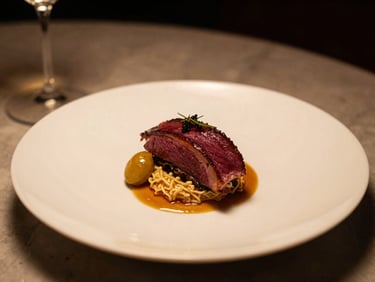 Beautifully plated gourmet dish, warm ambient lighting, elegant restaurant setting, shallow depth of field, 35mm