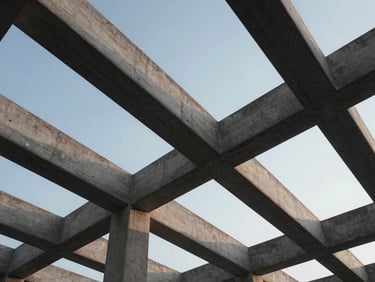 Low-angle shot looking up at a modern concrete-alternative structural framework, cool morning light