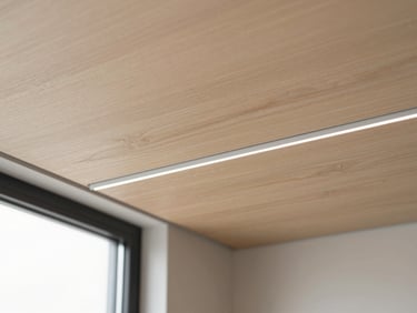 Matte-finish heavy-gauge PVC ceiling boards mimicking natural timber, sharp focus.