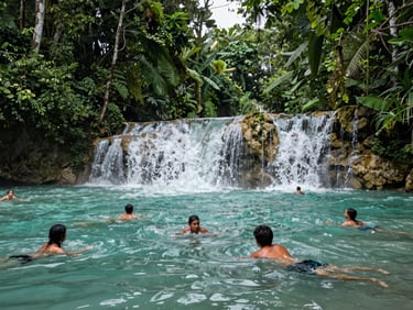 Young travelers swimming in turquoise waterfalls in Huasteca Potosina, lush green jungle background, natural light.