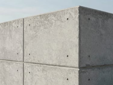 Close-up of a massive precast concrete wall standing in structural alignment, sharp clean edges, industrial daylight