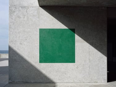 Abstract data visualization projected onto a stark concrete wall in an urban environment, high-contrast shadows, desaturated tones, 35mm.