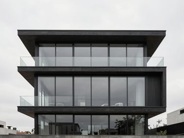 Modern minimalist penthouse in Polanco, floor-to-ceiling windows, dark wood accents, overcast daylight, 35mm