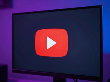 High-contrast close-up of a vibrant YouTube thumbnail design on a professional monitor, glowing neon red accents, crisp studio lighting