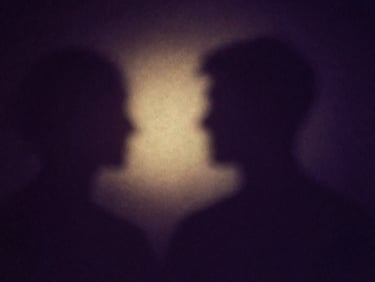 Moody fine-art photography of abstract conceptual art with deep violet shadows and a single streak of soft gold light, 35mm film grain