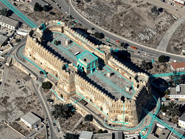 High-resolution satellite overlay of Erbil citadel with clean teal vector coordinate lines, sharp technical cartography style.