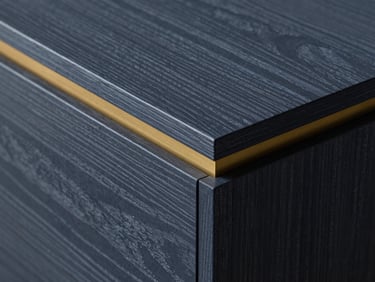 Macro shot of high-quality finished oak wood grain, modern architectural woodwork details, warm brass accents, high detail.
