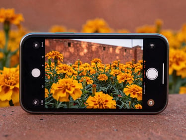 A smartphone screen showing a video being automatically reframed from horizontal to vertical, with a vibrant, dynamic interface.