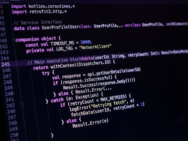 Extreme close-up of a high-resolution Android screen displaying a custom Kotlin code editor with neon purple syntax highlighting, dark moody studio atmosphere.