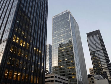 Wide architectural angle of a modern European financial district skyline, sharp glass reflections, corporate daylight
