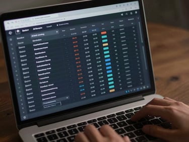 Close-up overhead shot of a laptop screen showing an AI lead-scoring interface with structured data rows, confidence scores, and pipeline stage labels, cool studio lighting, dark theme UI, hands at keyboard partially visible