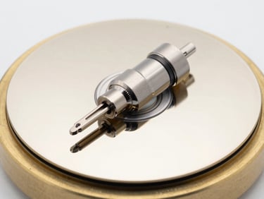 Extreme close-up of a high-precision ceramic disc cartridge inside a brass housing, studio lighting, technical focus