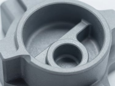 Close-up of a machined technical plastic component, showing clean edges and a smooth, precise finish, cool industrial lighting, 35mm