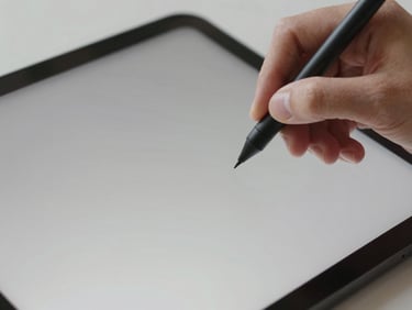 Stylus drawing on a clean tablet screen, sharp focus on the tip, modern studio setting, natural light, 35mm