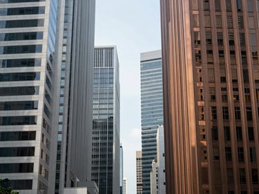 Crisp corporate photography of Singapore financial district skyline, clean geometric architectural lines, bright morning daylight, cool slate tones with warm bronze reflections, sharp focus, 35mm